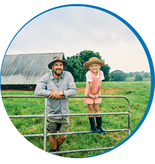 Father and daughter enjoying rural scenery