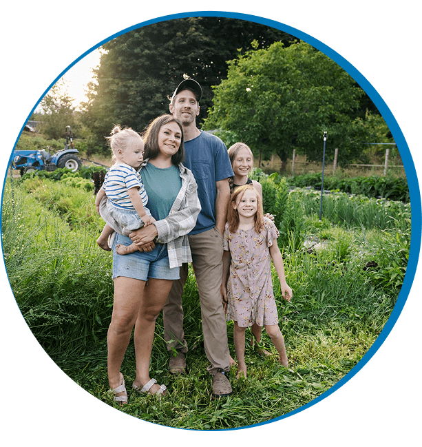 Family standing together in a garden