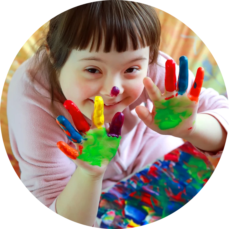 Smiling girl showing painted hands